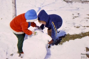 Joyce and Lauri building snowman